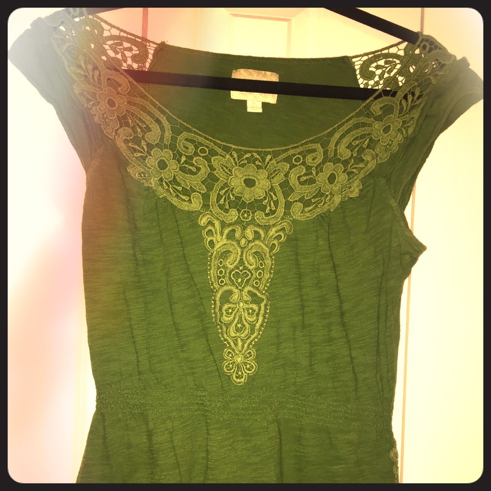 Green top with crochet details